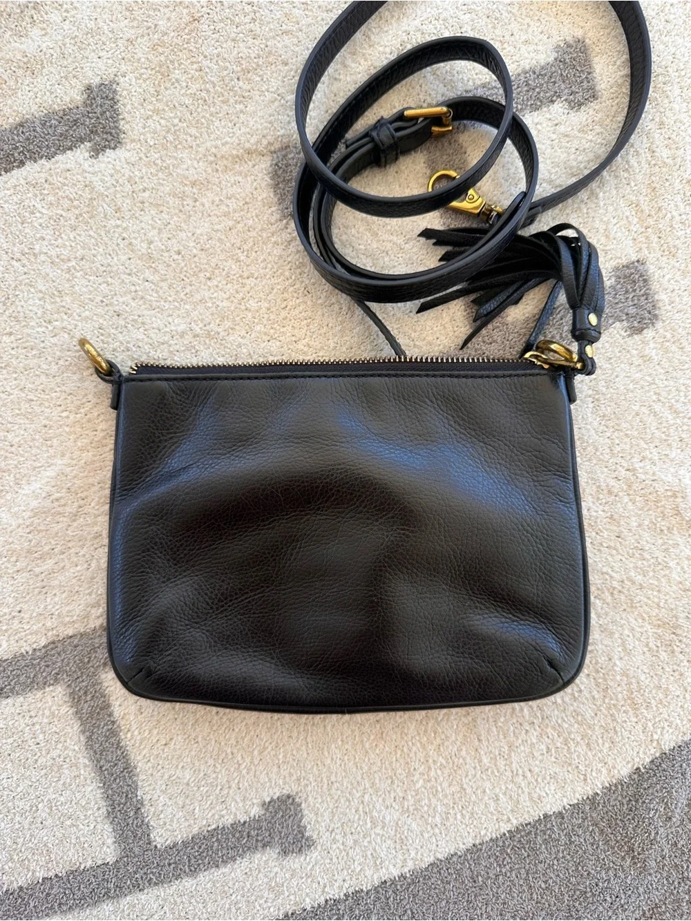 Fossil Black Leather Crossbody with Tassel and Gold Hardware